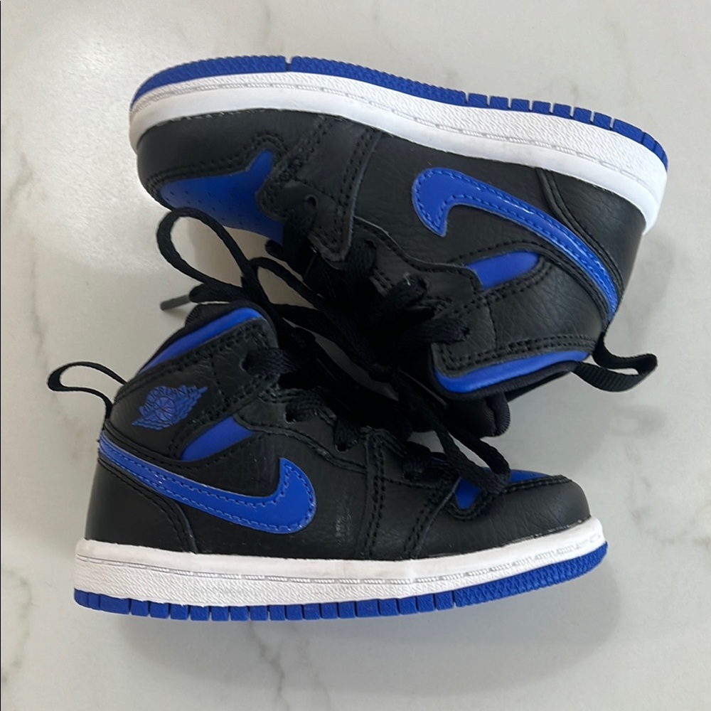 Nike Black and Blue High-Top Sneakers with Ankle Support